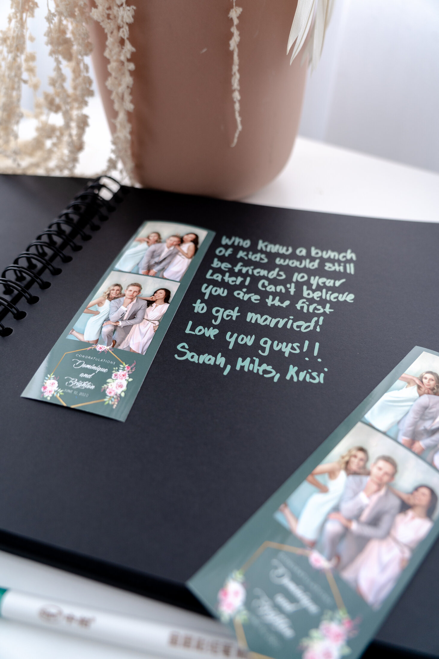A guestbook page with a photo booth strip and a handwritten note from guests