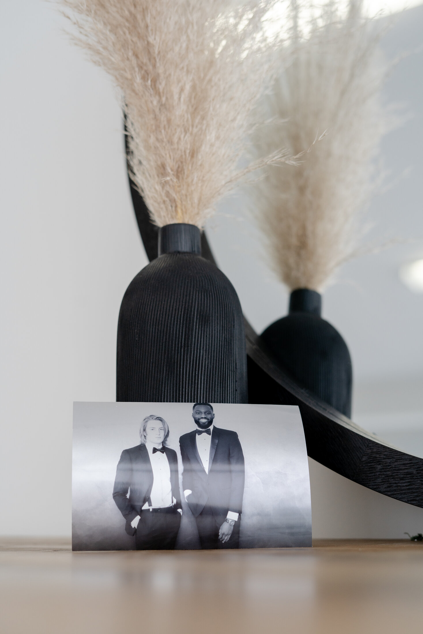 A printed photo booth strip displayed among styled decor
