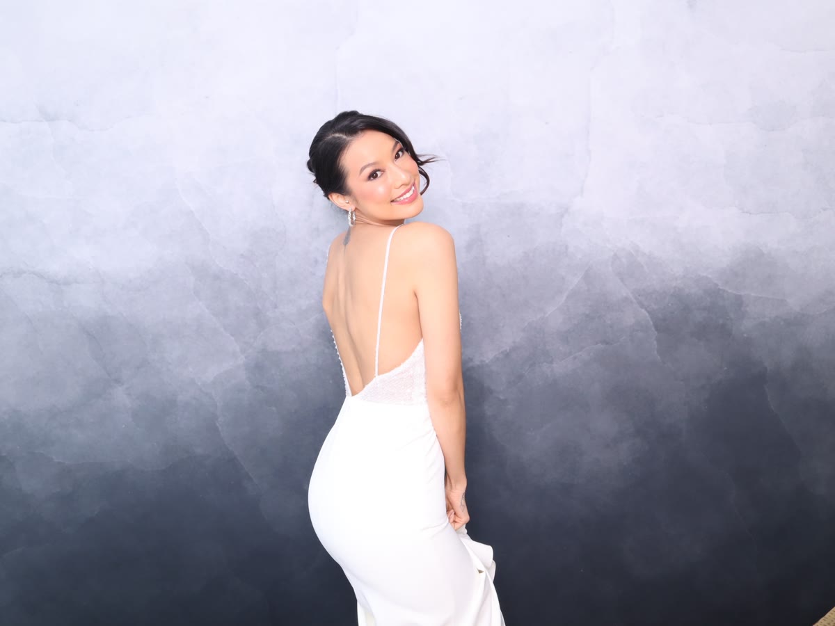 Bride against the Atlas Marble photo booth backdrop